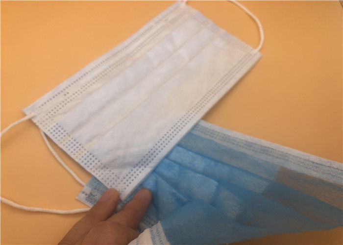As máscaraes protetoras médicas descartáveis dos cuidados pessoais protegem do azul da prova da poeira